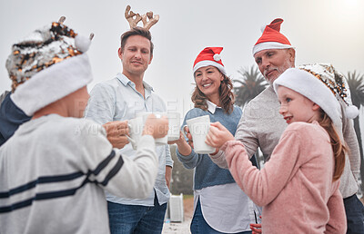 Buy stock photo Family, christmas and hat for toast with cup, smile and celebration with happiness, together and outdoor. Group, mug and happy for holiday, festive and eggnog for religion, event or party with coco