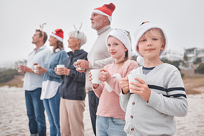 Buy stock photo Love, Christmas and freedom for happy family at the beach drinking eggnog, coffee or tea on big family vacation. Festive quality time for grandparents, parents and kids bonding on Amsterdam holiday