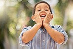 Backyard, portrait and surprised child with a smile playing outdoor in nature at his home. Happy, shocked and wow expression of a boy kid having fun in the garden during summer at his house in Brazil
