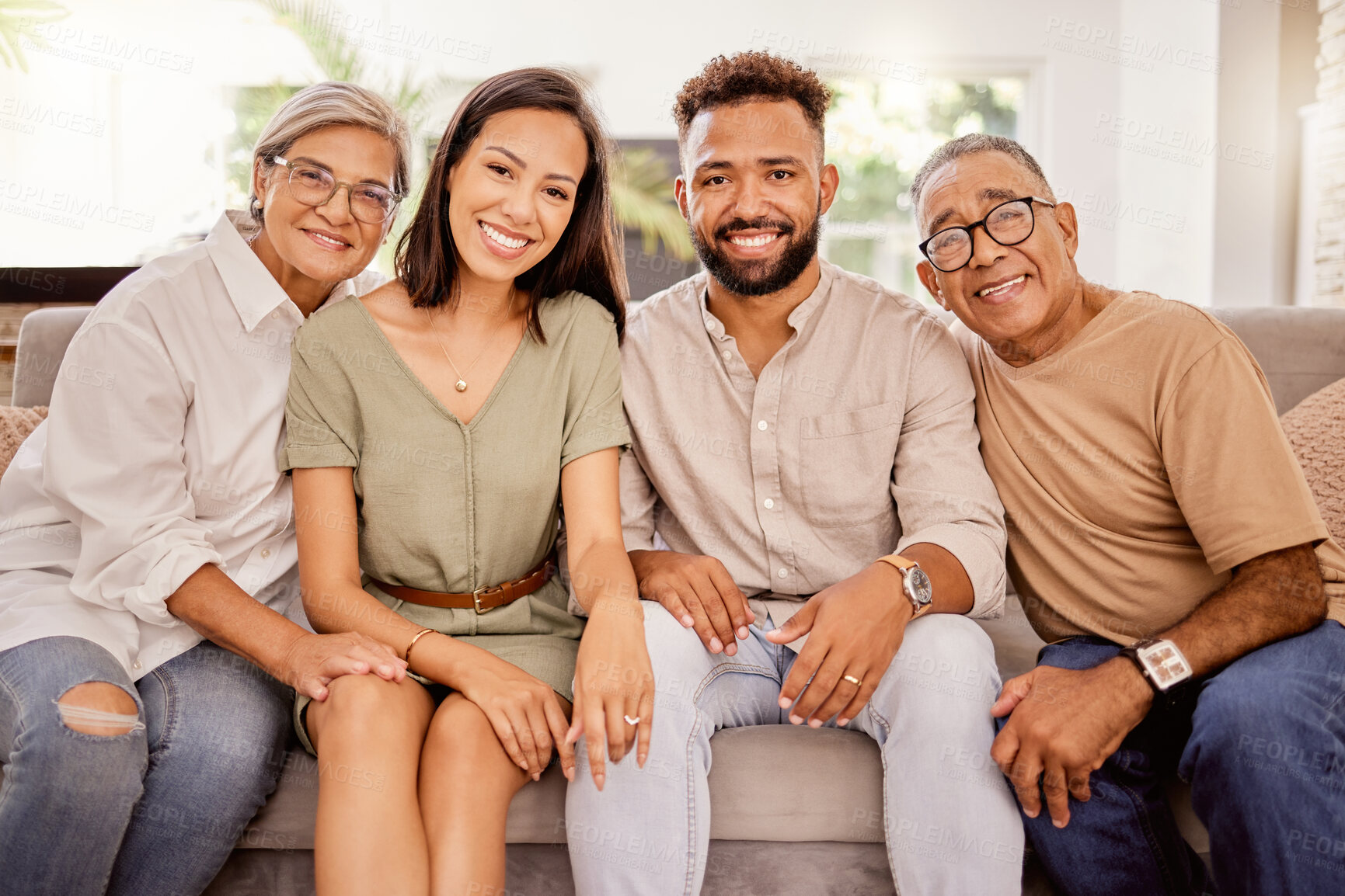 Buy stock photo Black family, happy and home living room couch of people together with elderly people. Portrait of a woman, man and senior parents on a house lounge sofa with happiness and love sitting on a chair