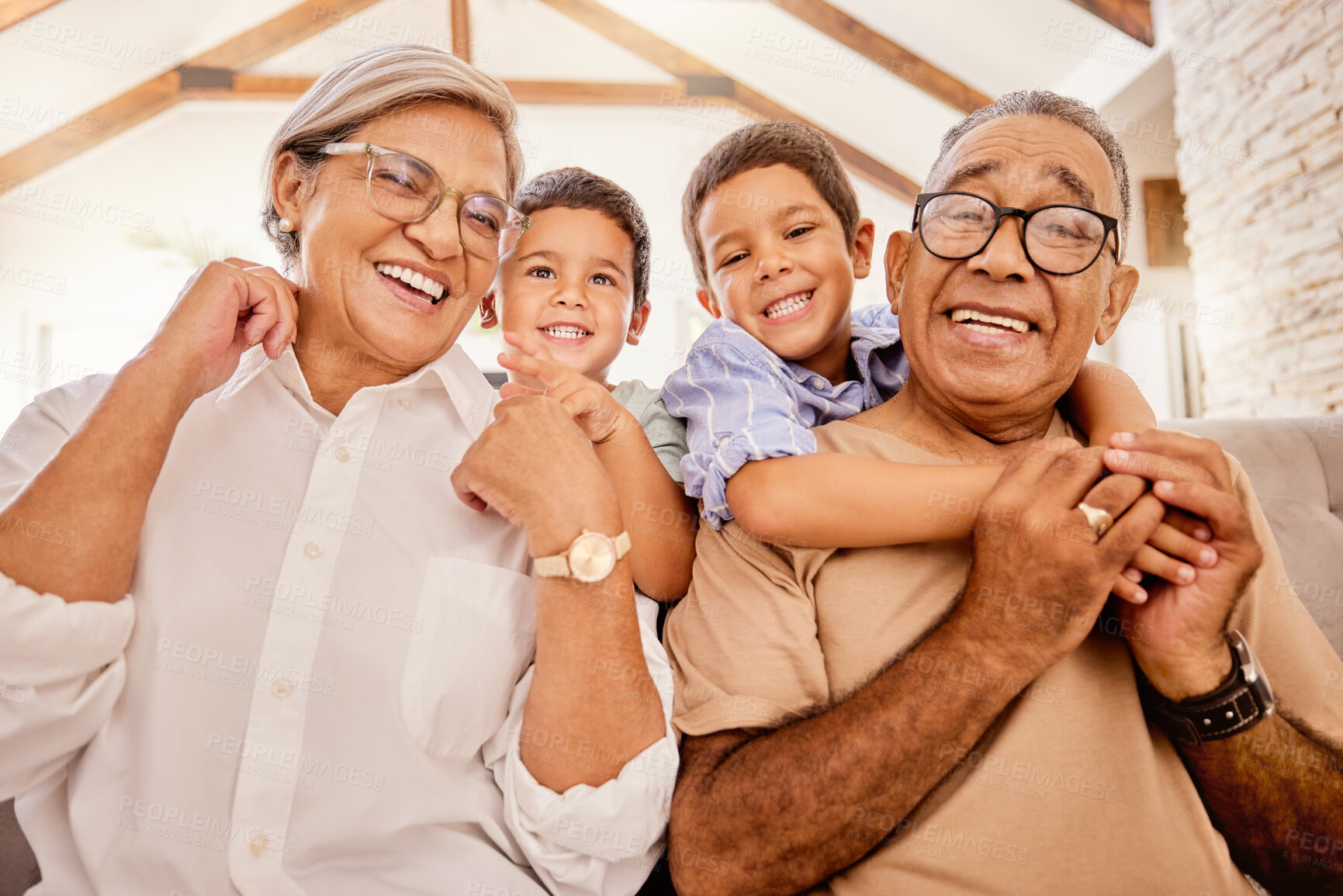 Buy stock photo Grandparents, children and sofa happy in home living room on vacation or holiday together. Kids, grandma and grandpa in retirement smile on couch in lounge with love for family portrait in house