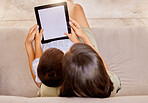 Mother, tablet and child screen, mockup and social media on a sofa from above in home. Marketing, advertising or product placement on technology with woman and boy watching movie subscription online