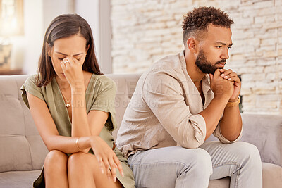 Buy stock photo Couple, divorce or stress on living room sofa in house, home or marriage counseling after fight, argument or affair. Sad, anxiety or depression for man or woman with mental health or breakup burnout