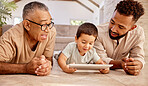 Family generation, tablet and relax child, father and grandpa play online video game, have fun and enjoy quality time together. Love, floor and black people bond while streaming movie on digital tech
