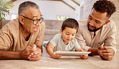 Buy stock photo Family generation, tablet and relax child, father and grandpa play online video game, have fun and enjoy quality time together. Love, floor and black people bond while streaming movie on digital tech