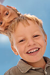 Happy, child and boy face in summer with a smile feeling happiness outdoor ready to play. Portrait of children, kids and youth faces together in nature of friends or siblings smiling with energy 