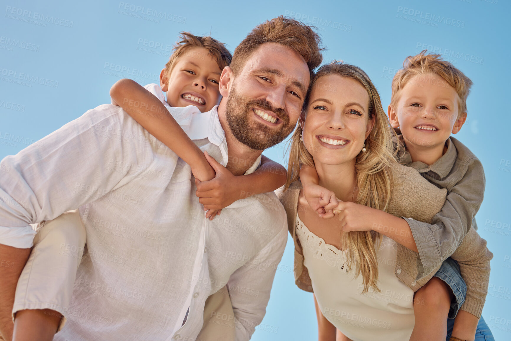 Buy stock photo Piggyback, portrait and family in nature, park or field for holiday together in Puerto Rico against a blue sky. Mother, father and happy kids with love, smile and playing on a vacation for adventure