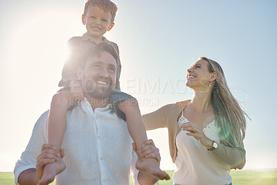 Buy stock photo Family, kids and piggyback with a mother, father and son in the park on a sunny summer day together. Children, love and bonding with a man, woman and boy outdoor on summer vacation or holiday