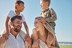 Happy family, travel and beach, kids relax on holiday while playing a shoulder game and having fun at the sea. Family, love and parents carrying children on an ocean trip in Miami, laughing and happy