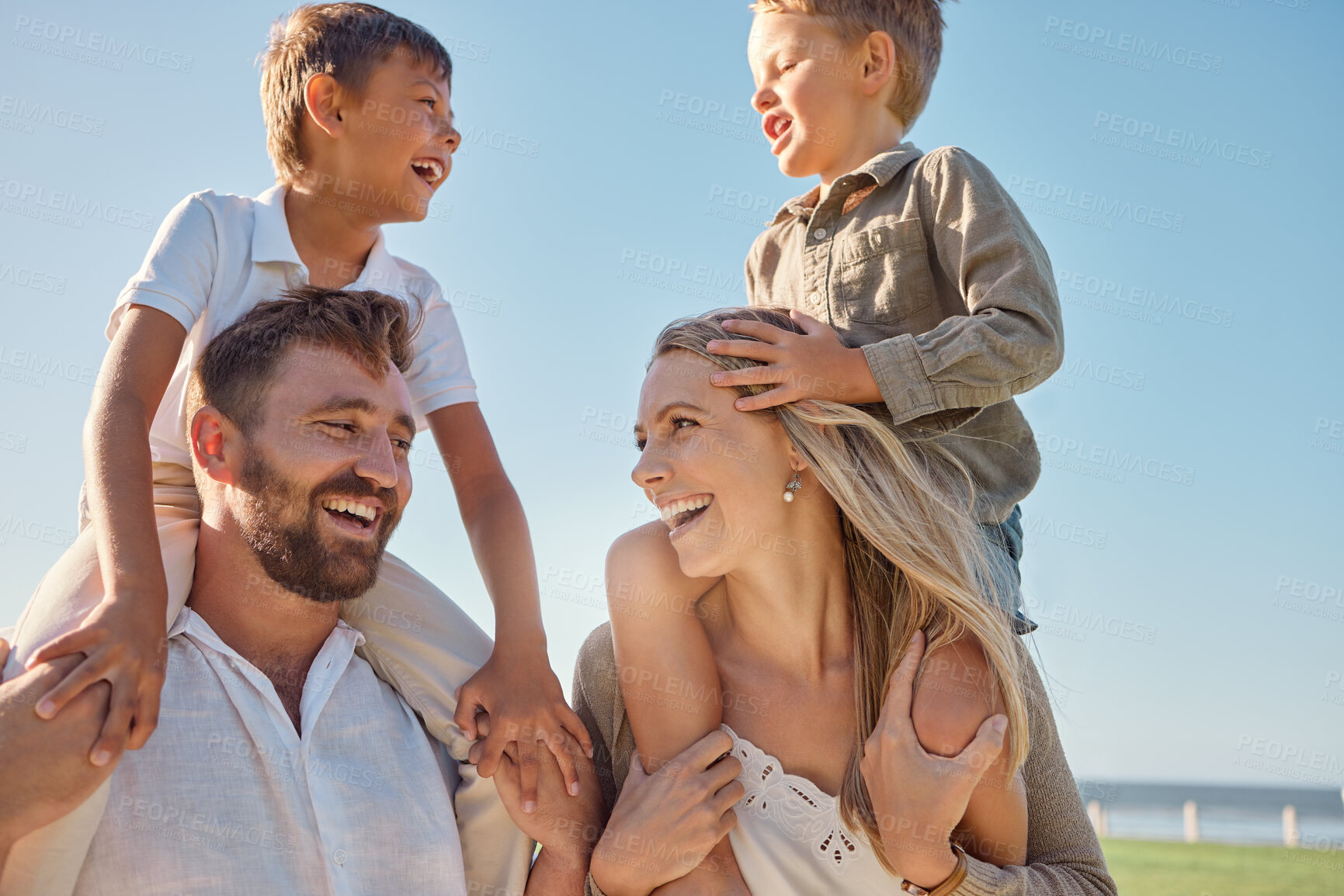 Buy stock photo Happy family, travel and beach, kids relax on holiday while playing a shoulder game and having fun at the sea. Family, love and parents carrying children on an ocean trip in Miami, laughing and happy