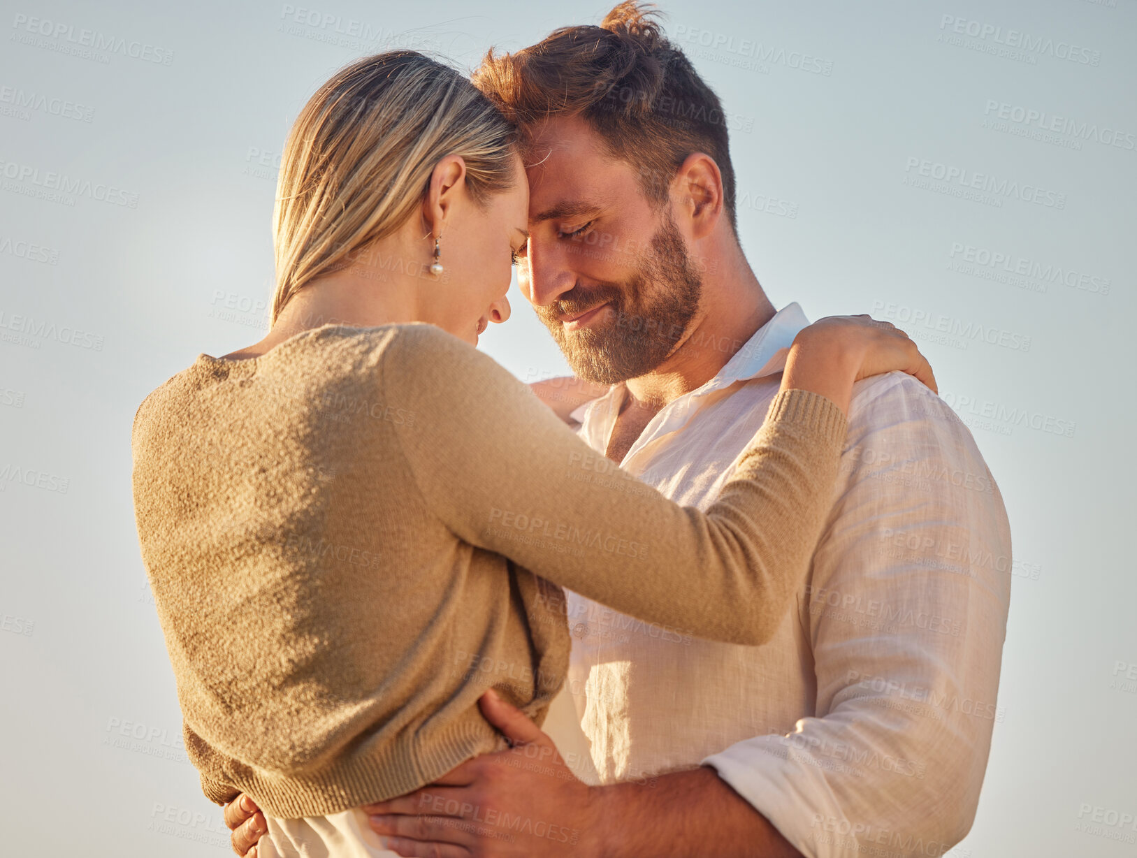 Buy stock photo Love, couple and being happy for marriage, romantic vacation and smile together for anniversary. Romance, man and woman doing embrace, holding each other and being intimate for relationship on travel