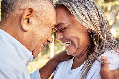 Buy stock photo Love, senior couple and smile being happy, bonding and loving for anniversary, marriage and outdoor together. Romantic, elderly woman and mature man being cheerful, embrace and enjoy romance hug.