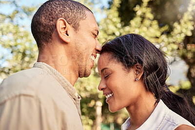 Buy stock photo Love, black couple and being happy, smile and together bonding for relationship, marriage and outdoor. Romance, man and woman being joyful, happiness and loving for anniversary embrace and romantic.