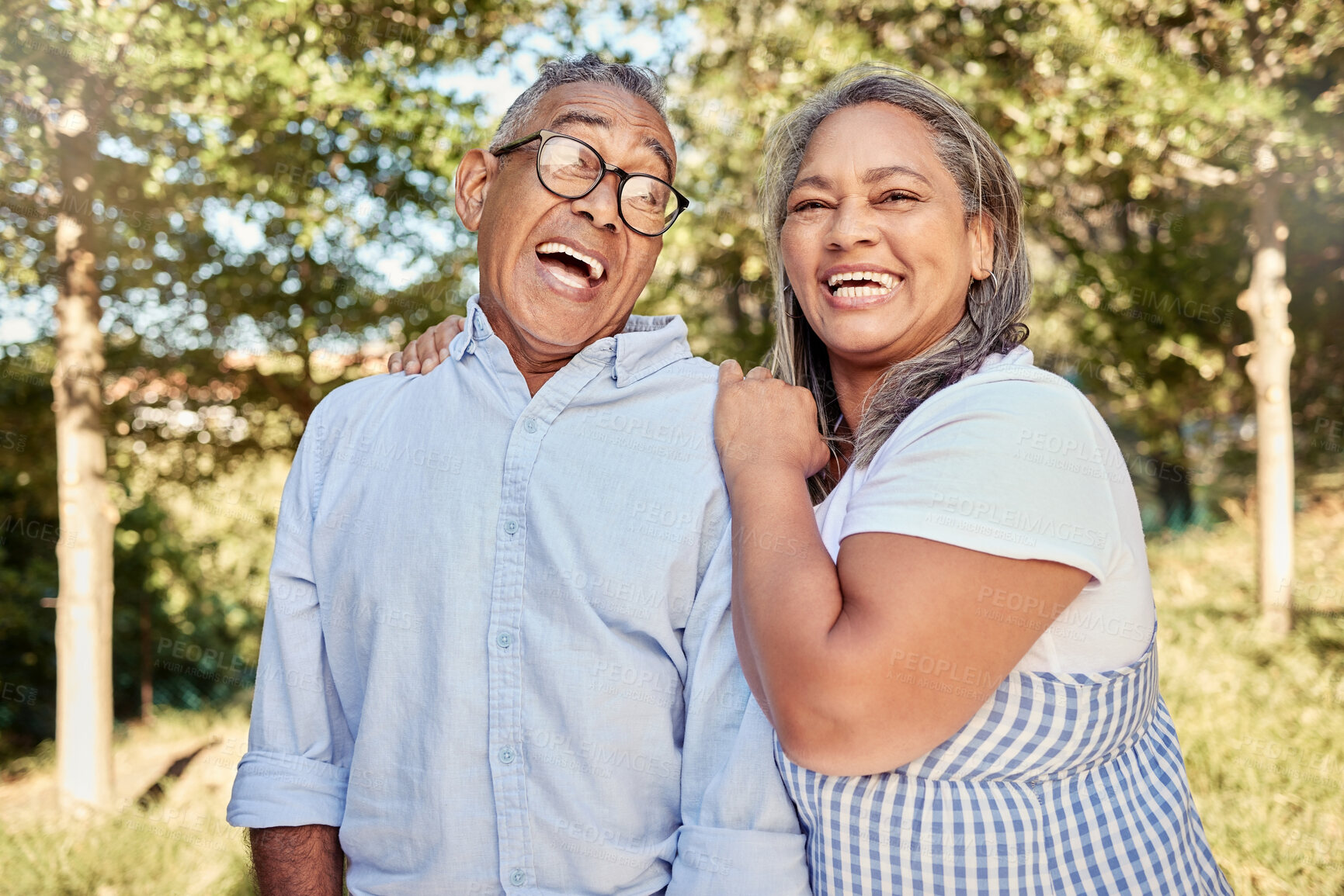 Buy stock photo Love, happy and laugh with a senior couple in a garden outdoor for bonding or fun on vacation. Together, relationship and romantic with an elderly man and woman pensioner outside on a summer date