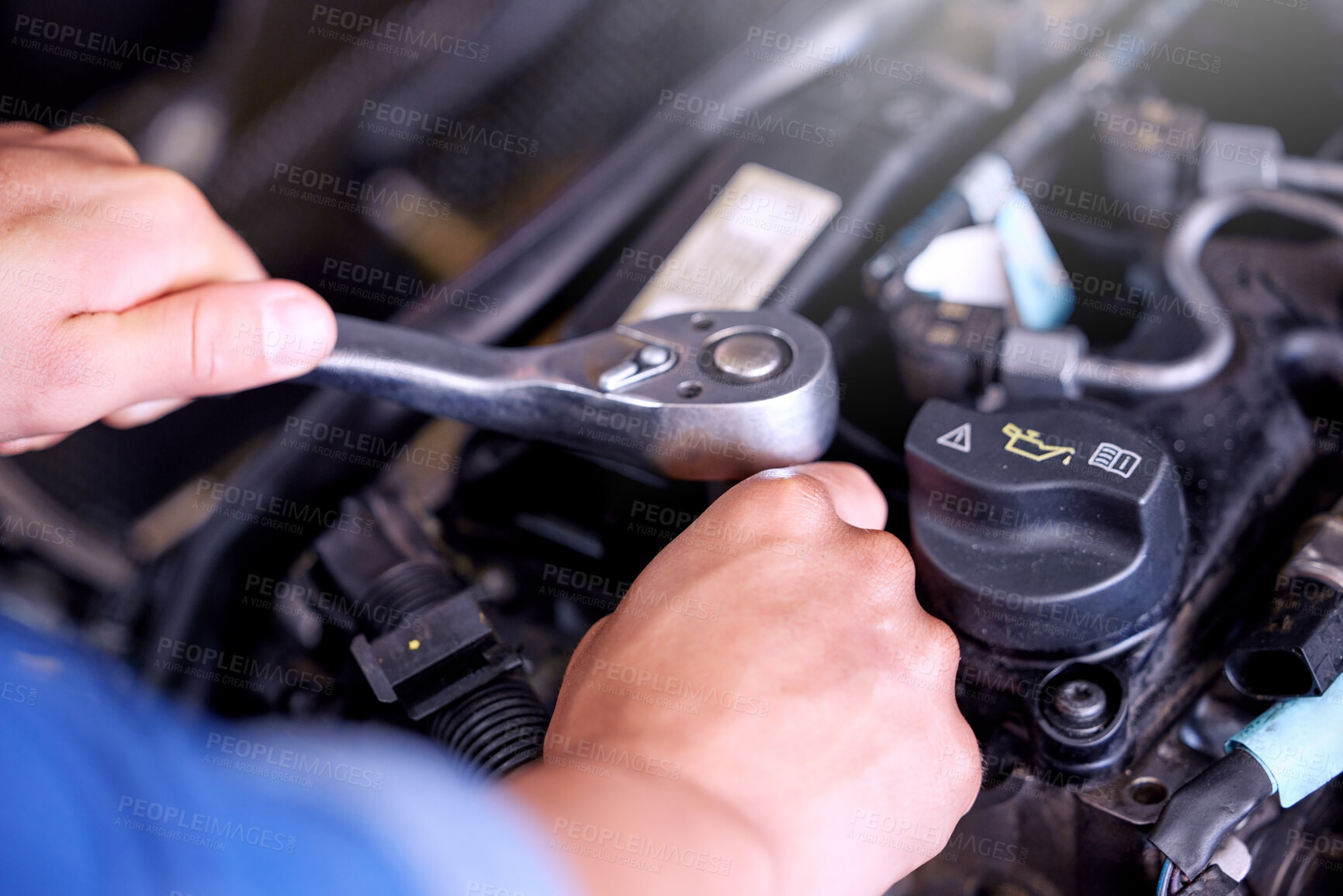 Buy stock photo Hands, engine and mechanic with a man engineer working with a spanner tool under a car hood in a workshop. Worker, industry and engineering with a male maintenance professional at work in his garage