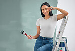 Wall, portrait and woman painting home with smile resting on ladder for balance with mockup. Renovation, improvement and young home owner girl holding paintbrush for green paint container.

