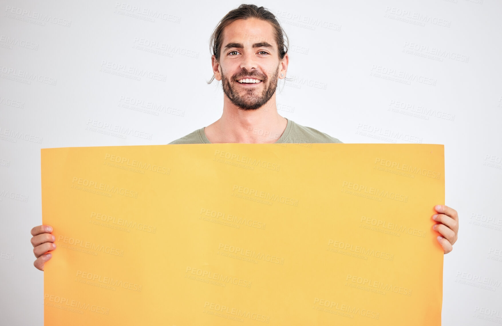 Buy stock photo Mockup, advertising and man with yellow poster for text, announcement and message. Marketing, design and guy holding bright cardboard banner in hands with copy space, blank and empty space in studio