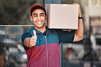 Thumbs up, courier man and delivery package from ecommerce online shopping store. Happy young friendly retail shipping worker, customer cargo box and thank you or well done support hand sign