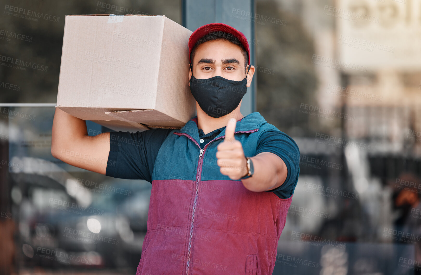 Buy stock photo Thumbs up, box and man with face mask for delivery with export or transportation service. Success, logistics and portrait of courier guy with approval gesture to deliver package during covid pandemic