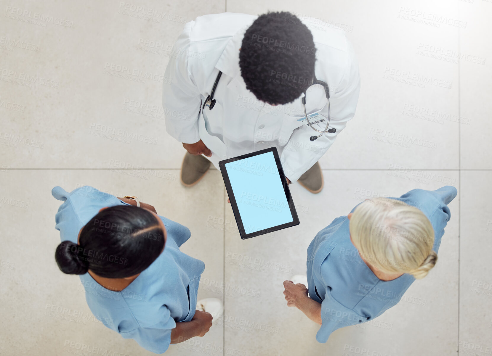 Buy stock photo Topview of doctors, tablet green screen and nurses mockup of hospital for patient healthcare with professional consultation. Digital health report, medical diagnosis and consulting colleagues at work