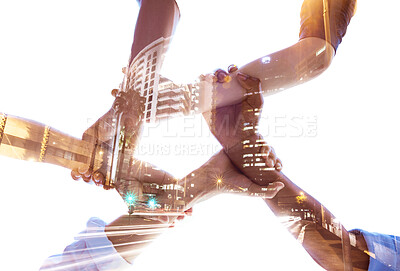 Buy stock photo Holding hands, teamwork and diversity with building double exposure for global collaboration, architecture growth and community success. Low angle, men and women with abstract city overlay in support