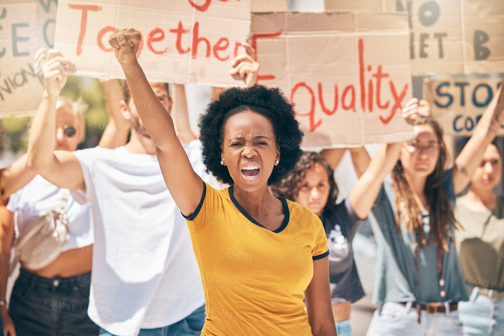 Buy stock photo Protest, crowd of people and black woman in the street, fist in air marching for equality, human rights and freedom. Diversity, protesting and woman shouting for justice in city with cardboard signs