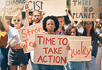 Group, protest and portrait in street, poster or climate change with march, walking or together for change. People, diversity or action in activism, equality or empowerment for racism, lgbt and earth