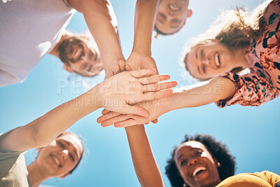 Buy stock photo Hands, friends or support in community collaboration, trust or motivation for goals, success or solidarity. Low angle, huddle or circle of smile or happy people, men or women in diversity celebration