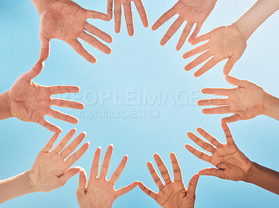 Buy stock photo Open hands, circle and diversity support, people and community group and freedom of racism on blue sky background. Below solidarity, partnership and motivation of goals, trust or global collaboration
