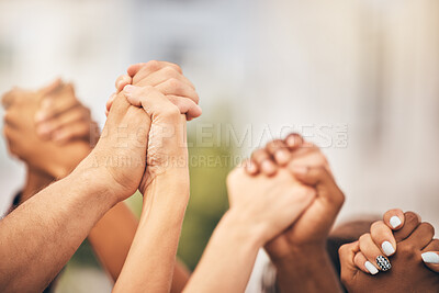 Buy stock photo Diversity, community collaboration and holding hands in air strong together or racial empowerment march. Peace protest, trust teamwork and friendship help or friends, group or support human rights