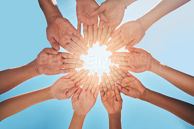 Buy stock photo Hands in circle together, blue sky and sun, diversity and community in collaboration for support and success. Teamwork, hands together and summer sunshine, positive vision and trust between friends.