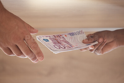 Bribe, hands and cash money exchange for a business bribery or illegal partnership offer. Closeup of businessmen with a dollar finance deal for money laundering, corruption or loan payment in office.
