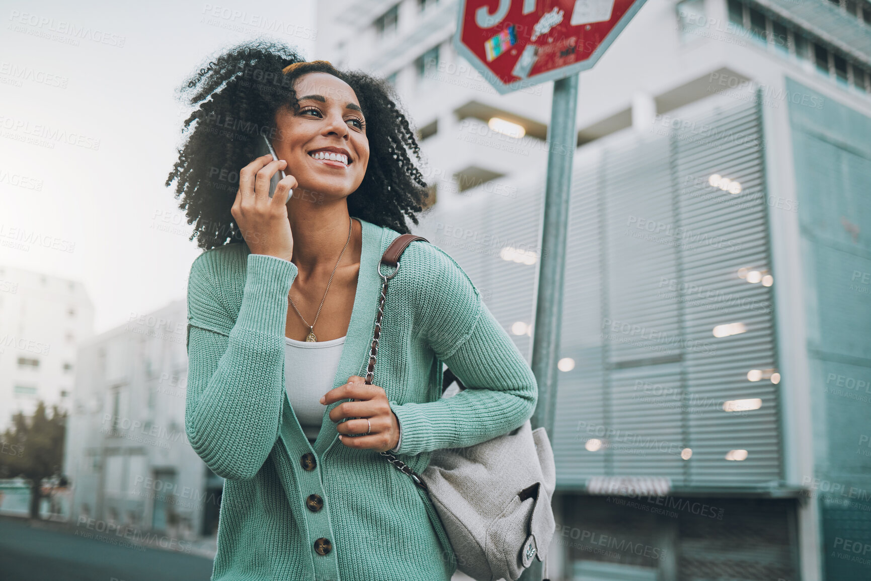 Buy stock photo Black woman, phone call and smile in street, city or town for travel, tourist or adventure outdoor. Woman, smartphone or metro for communication, traveling or conversation with phone in road with bag