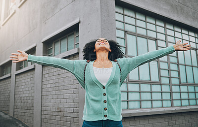 Buy stock photo Freedom, happiness and city woman with open arms standing outside building on street with winner smile. Happy excited black woman, urban lifestyle holiday or weekend to relax and enjoy free girl time