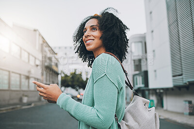 Buy stock photo Happy, black woman and phone for travel in the city of a tourist enjoying sightseeing in an urban street. African American female traveler in communication or navigation on smartphone in South Africa