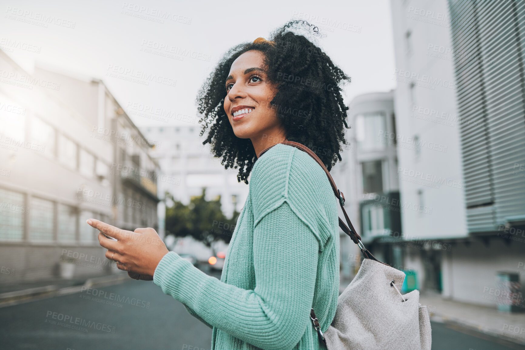 Buy stock photo Happy, black woman and phone for travel in the city of a tourist enjoying sightseeing in an urban street. African American female traveler in communication or navigation on smartphone in South Africa