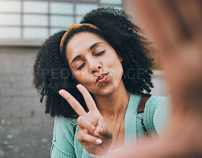 Buy stock photo Selfie, peace and black woman pouting in the city for social media, internet or a mobile app. Young, trendy and face of an African girl with photo smile, fashion and hand sign for the web online