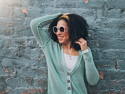 Buy stock photo Brazilian woman, fashion and sunglasses by city building wall for fun summer holiday, weekend break or urban vacation. Smile, happy student or afro tourist in trendy, cool clothes and style eye care