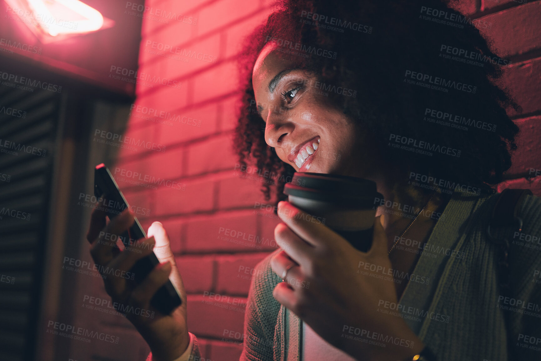 Buy stock photo Black woman, smartphone and coffee cup with smile, night and social media for chat, browse online and outdoor in city. Young girl, happy female and with phone for communication, internet and connect.