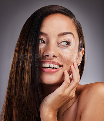 Buy stock photo Face, beauty and vitiligo with a model woman in studio on a gray background for health or wellness. Cosmetics, skin and natural with an attractive young female posing to promote a skincare product
