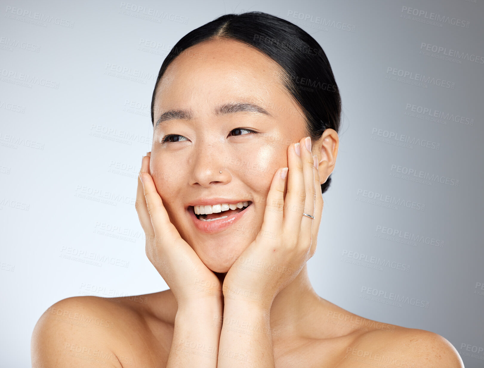 Buy stock photo Skincare, beauty and woman with smile for dermatology against a grey mockup studio background. Face of a happy, relax and Asian model excited about facial care, wellness of skin and cosmetics