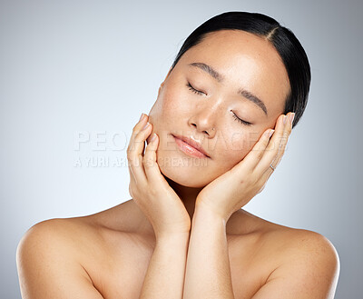 Buy stock photo Skincare, asian beauty and woman with makeup, face cosmetics or natural glowing skin. Wellness, healthcare or aesthetic Japanese girl with eyes closed and facial self care isolated on grey background