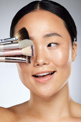 Buy stock photo Makeup, brush and beauty woman for asian skincare glow, cosmetics or product advertising with studio mock up. Dermatology, skin care and artist or Japanese model cover eye for marketing mockup