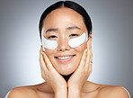 Skincare, beauty and collagen eye mask on woman from Japan for cooling and anti aging skin treatment for youth. Luxury spa facial, natural product for eyes and smile on face of beautiful asian girl.