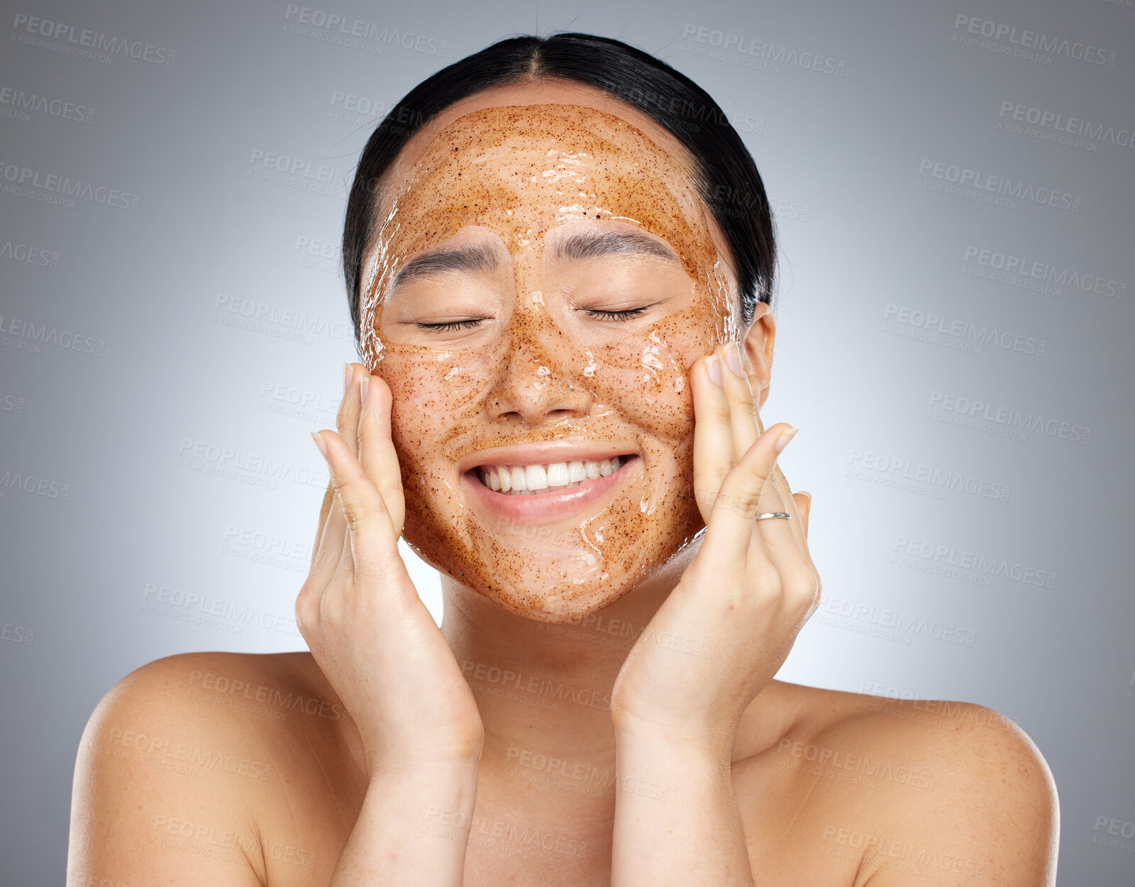 Buy stock photo Facial, product and woman skincare face mask cosmetics cleaning smooth and soft skin in Asian studio. Relaxed, smile and happy beauty model peeling a healthy natural grooming scrub or mud in Seoul 