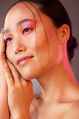 Buy stock photo Japan face, neon makeup or model woman for skincare, facial beauty or cosmetics  wellness in studio. Skin health, relax and peace girl with pink eyeshadow, luxury product or creative organic art