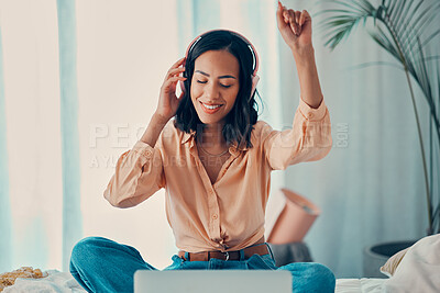 Buy stock photo Woman, music and bed with laptop, dancing and headphones in bedroom, relax and smile. Girl, dance and room with streaming, computer and listen on web, internet and app for radio, audio and technology