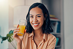 Health, orange juice and wellness woman on a healthy diet for nutrition, vitamin c and happiness with drink in glass in house. Portrait of female drinking morning fruit beverage for breakfast energy