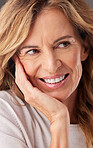 Face, beauty and skincare with a mature woman in studio background for wellness and vitality. Cosmetic, anti aging and skin with a beautiful happy woman taking care of her body with a happy smile