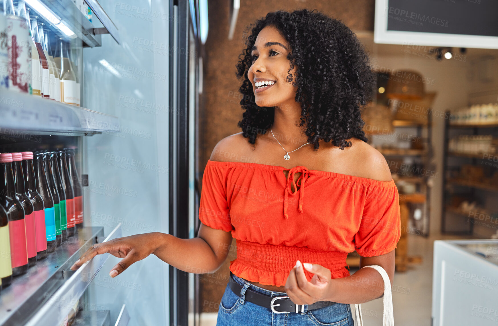 Buy stock photo Happy, grocery shopping and woman in a supermarket with drinks at a retail store in Sao Paulo. Happiness, smile and girl from Brazil buying a beverage on a shelf in a food shop while on vacation.